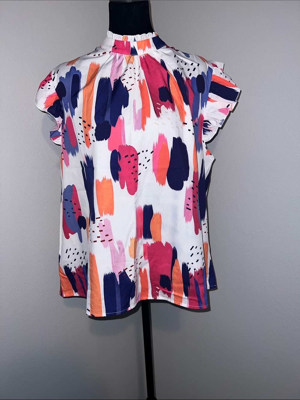 Mock Neck Flutter Sleeve Blouse in White with Navy, Pink & Orange Brushstrokes